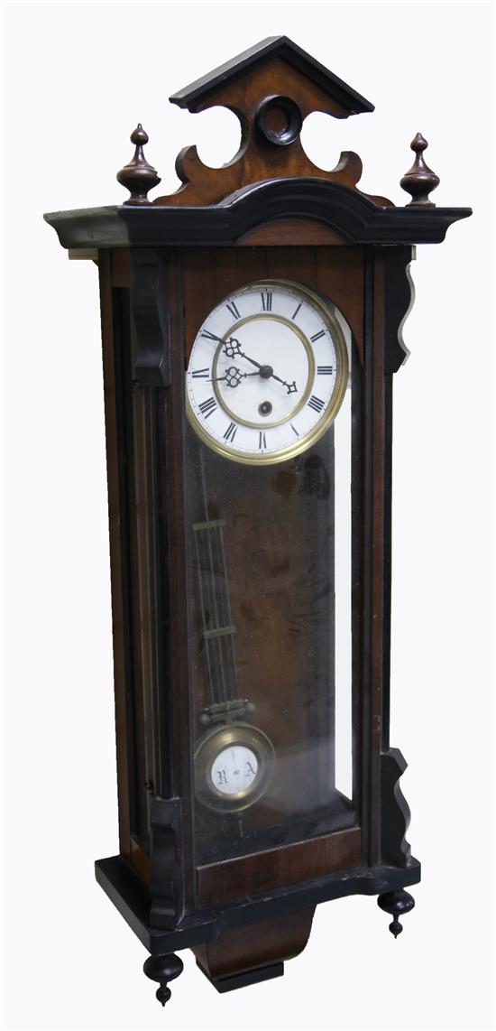 An early 20th century walnut and ebonised Vienna wall clock, approx. 31in.
